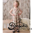 lanyka_nyari_ruha_bezs_pirosrozsa_mintás_elolrol_tavolibb_borsika_porteka.jpg