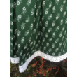 Zöld színű, apró virágos, zöldfestő mintájú, kicsit pörgős néptáncos szoknya gumival (200 cm körben)